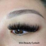 A client's eyes with beautiful, voluminous 9D volume lash extensions that were applied by Mini Beauty Eyelash.